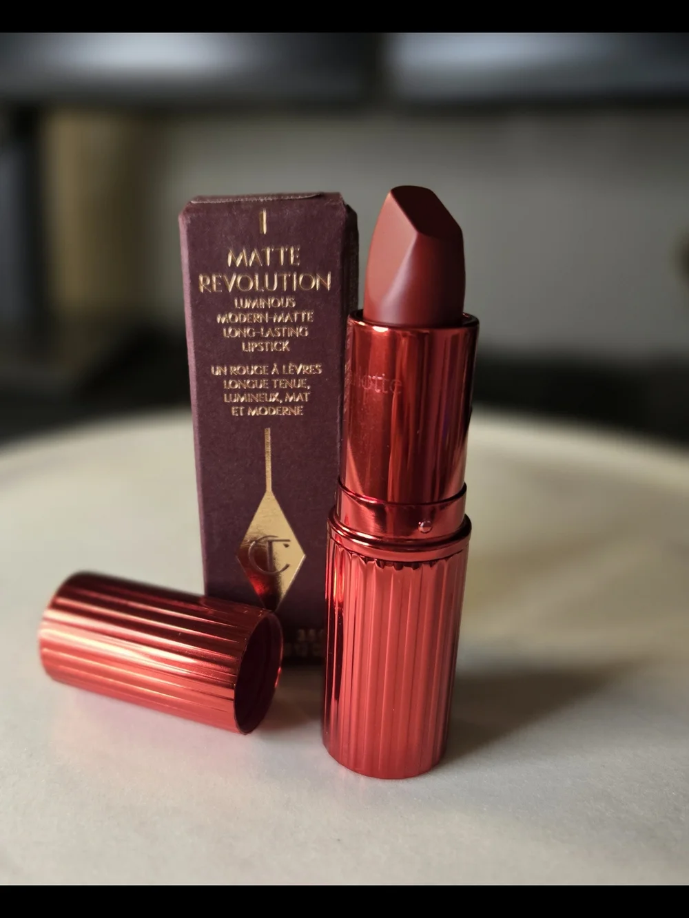Charlotte Tilbury Matte Revolution Lipstick — CINEMATIC RED NIB